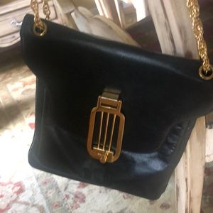 Black leather bag gold clasp